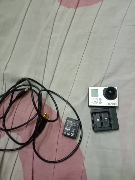 gopro hero 3(not working) with charger (working) 0