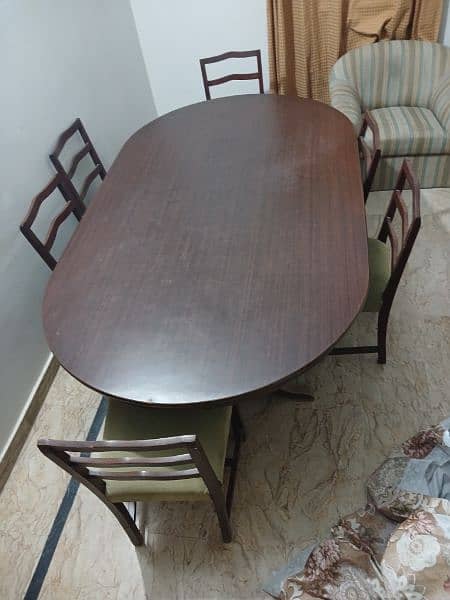 a luxurious dining table with 6 chair all are new condition 1