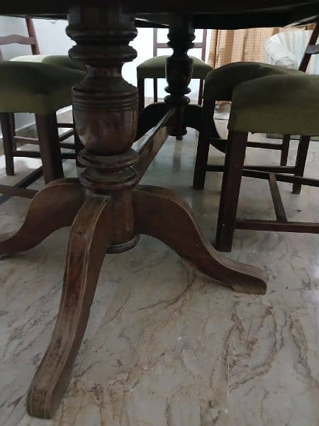 a luxurious dining table with 6 chair all are new condition 8