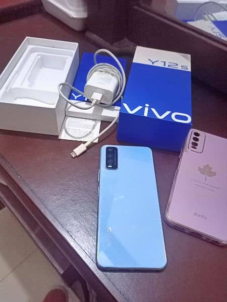 Vivo y12s . condition 10 by 10 . with all accessories. 5