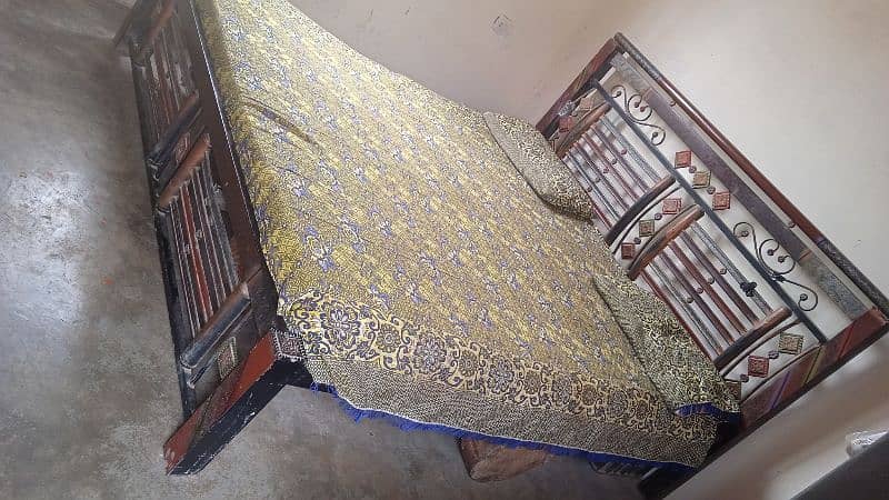 Duble bed iron 6 by 6.5 size. with out mattress 1