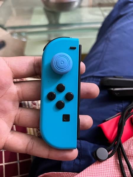 Nintendo Switch Original Joycon Controller Red and Bkue 1