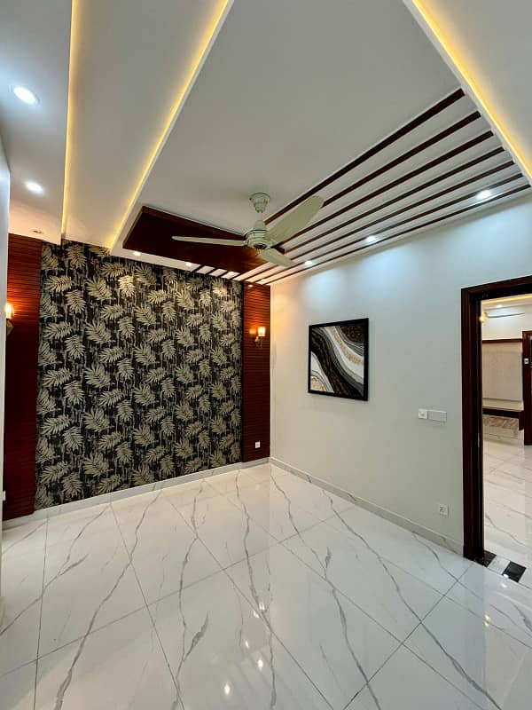 10 Marla Brand New Ultra Modern Designer ,Next Generation Lavish House For Sale In Sector C Near To Talwar Chowk , Walking Distance Comercial Hub ,Near Grand Mosque LDA Approved Area Demand 4.6 Bahria Town Lahore 24