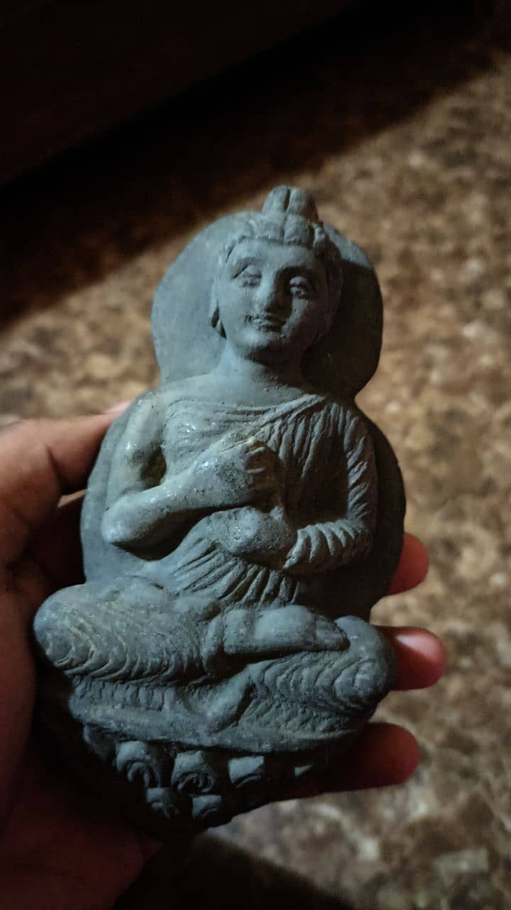 Old Budhha antique sculpture. 0