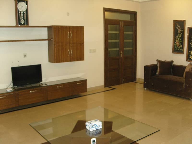 15,000 per day, furnished 3-Bed Lower Portion With Parking 0