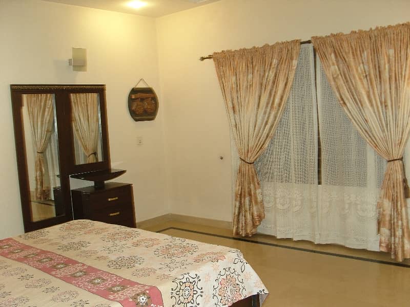 15,000 per day, furnished 3-Bed Lower Portion With Parking 20