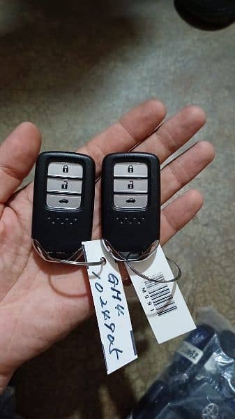 All auto car keys and rimot programming Sajid auto car kye1 3