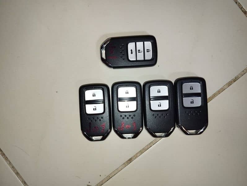 All auto car keys and rimot programming Sajid auto car kye1 18