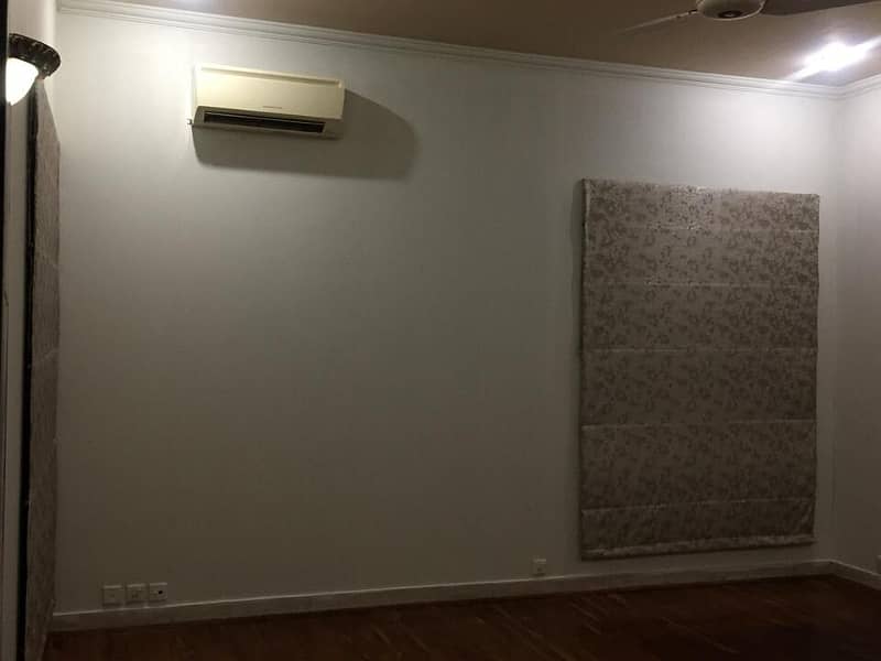 One Kanal House Available For Rent in DHA Phase 4 Basement Hall. 1