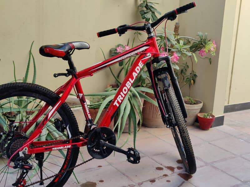 RED TRIOBLADE GEAR BICYCLE 1