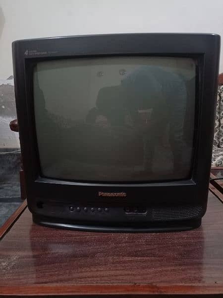 Old model Panasonic TV with stand 9