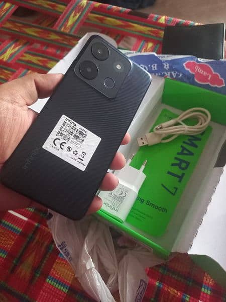 infinix smart 7 4+3/64 complete sman with warnty new condtion 1