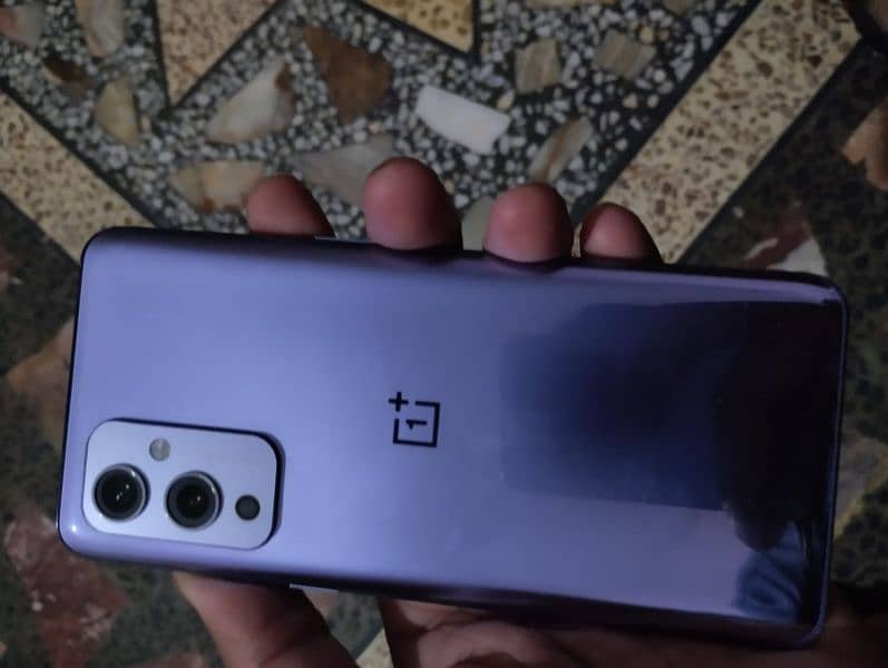 OnePlus 9 5g 12gb ram 128gb dual Sim approved just back pe line ha 7