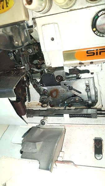 siruba over lack machine with sarbo motor 1