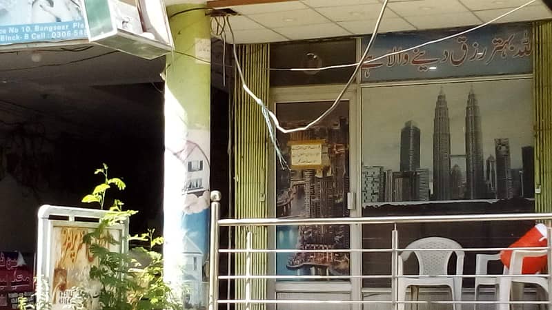 Ideal Location corner shop for sale in commercial market satellite town 0