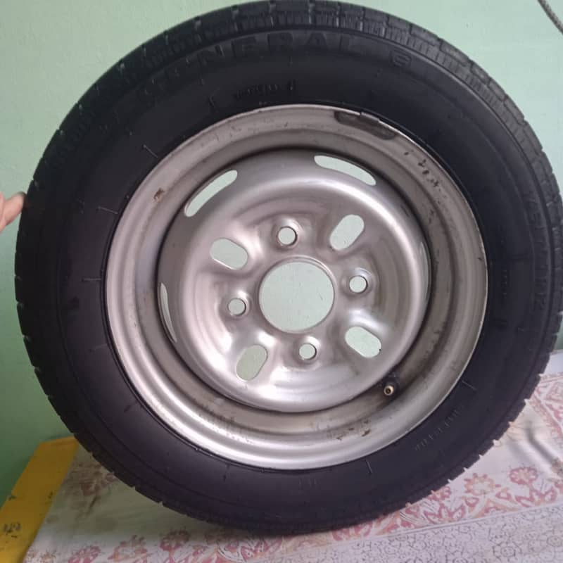 Mehran car new tyre with rim 2