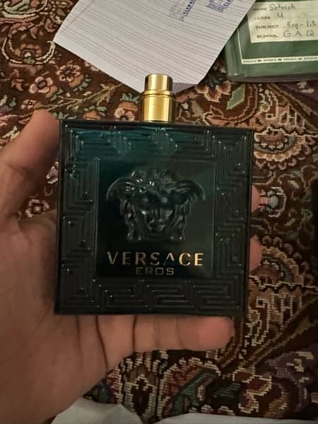 100% original Perfume slightly used otherwise complete bottle 4