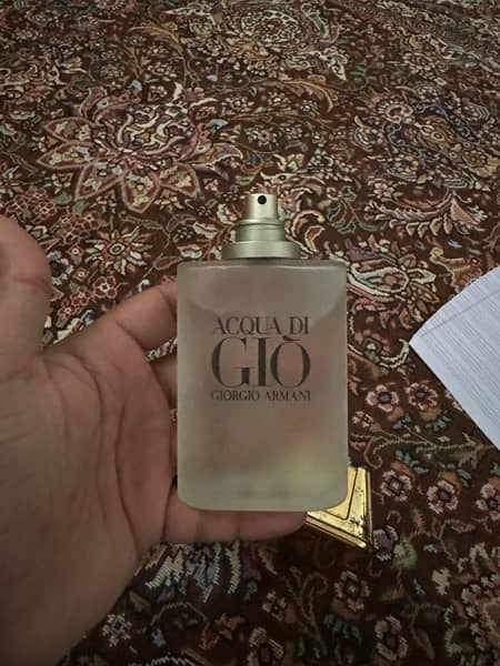 100% original Perfume slightly used otherwise complete bottle 5