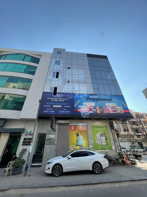 Dha Ph 7 | On The Junction Of Dha & KPT Flyover | 3rd Floor | 500 Sqft Office Floor | 3 Side Corner | Rented On 45k | Hi Speed Lift | Balcony | Modern Glass Elevation | Bank Location | Reasonable Demand | 0