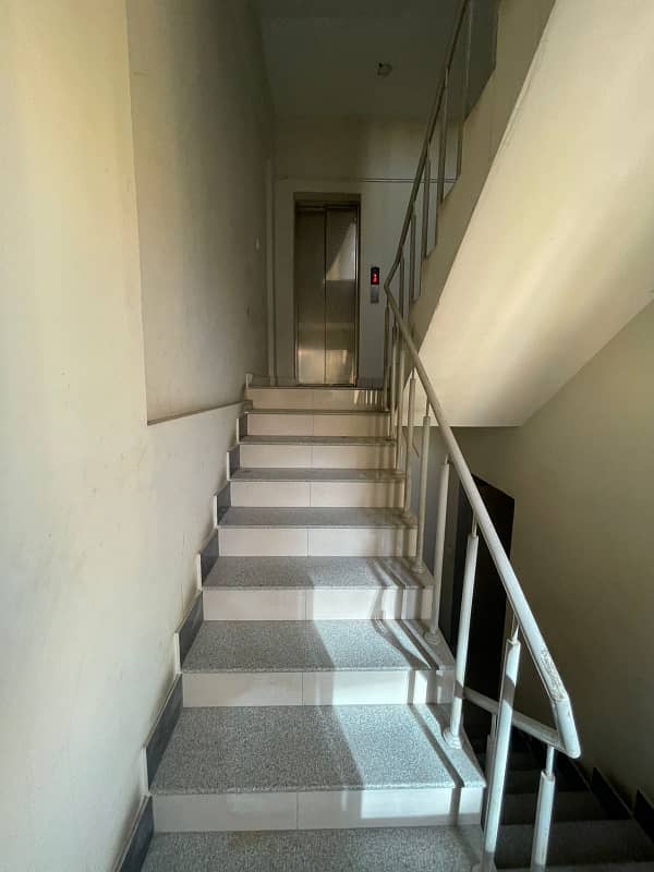 Dha Ph 7 | On The Junction Of Dha & KPT Flyover | 3rd Floor | 500 Sqft Office Floor | 3 Side Corner | Rented On 45k | Hi Speed Lift | Balcony | Modern Glass Elevation | Bank Location | Reasonable Demand | 2