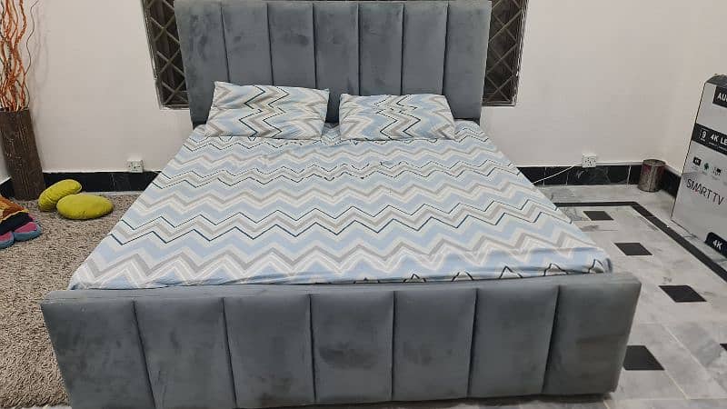 grey colour bed  with mattress 0