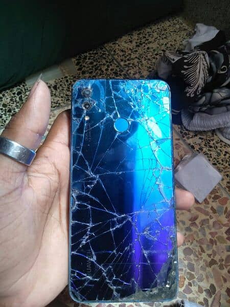 all okay mobile hai bus back site ka glass crack hai and non pta hai 5