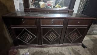 Old furniture style bed with dressing table and side table
