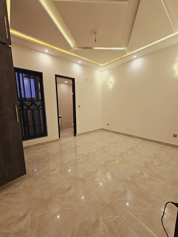 Low Budget Brand New Luxury 5 Marla villa House is in Bahria Town Lahore 14