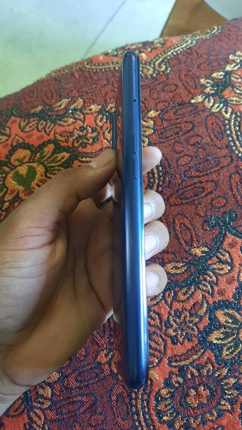Realme 7po with box and original charger 1