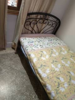 single iron bed