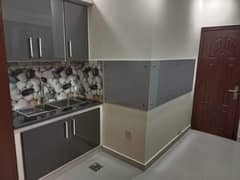 lower Ground Floor Portion Separate Entrance 2 bed With Garden Servent Room Near National Stadium, Aga Khan Hospital