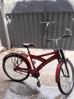 Red 26" size bicycle