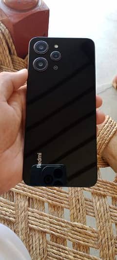 my Xiaomi redmi 12 - 8/128 black colour 10 by 10 condition