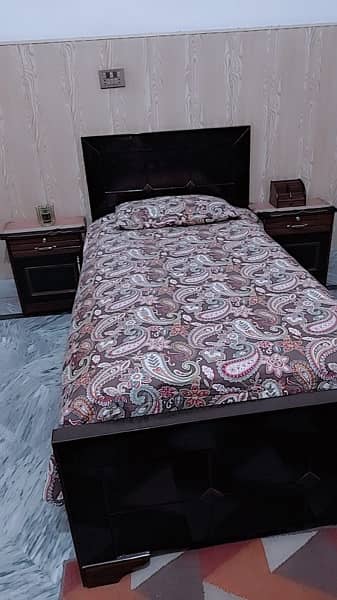 single bed with 2 side tables 2