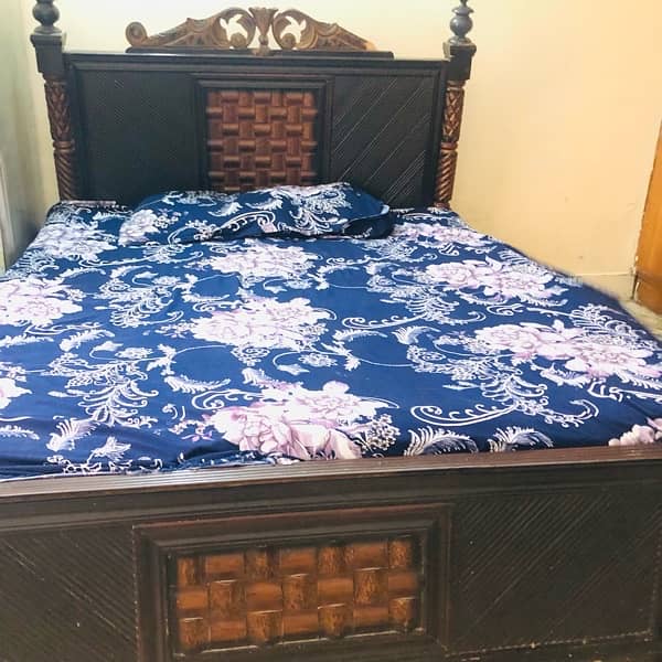 wooden bed good condition 0