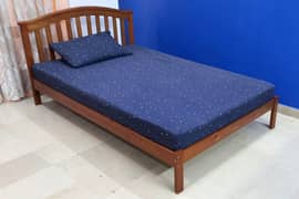 Bed with Mattress and a Slider