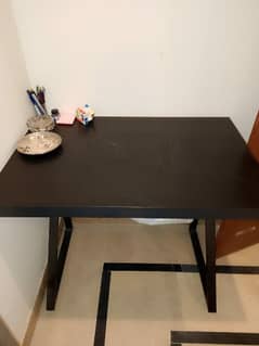 wooden heavy material table with chair