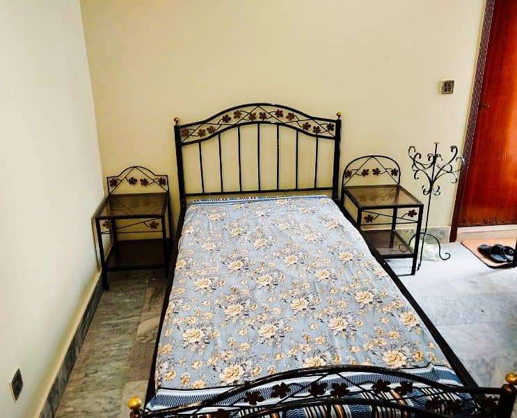 A Single Rod Iron Bed Set available for Sale. 1