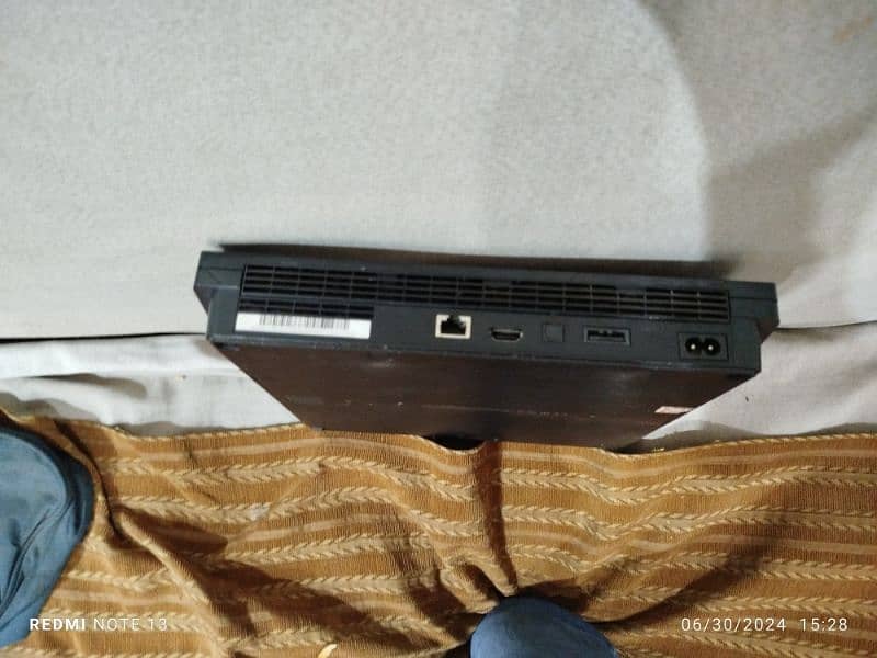 playstation 3 with 2 controller and with charger . 03200113117 1