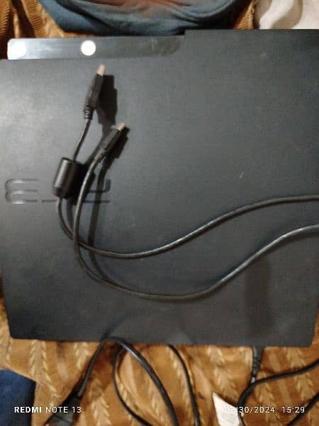 playstation 3 with 2 controller and with charger . 03200113117 2
