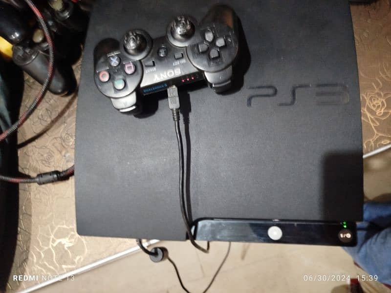 playstation 3 with 2 controller and with charger . 03200113117 4