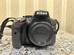 Nikon D5300 DSLR with AF Nikkor 18-50mm