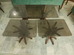 set of one center table and two side table made of glass and wood