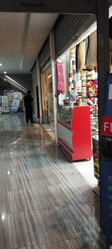 A. Q super market ground floor ready shop available for sale in bahria Town Karachi 4