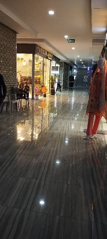 A. Q super market ground floor ready shop available for sale in bahria Town Karachi 8