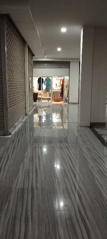A. Q super market ground floor ready shop available for sale in bahria Town Karachi 25