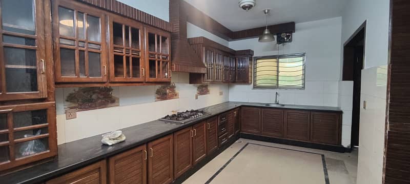 24 Marla 3 Story House With Basement Available For Rent, 9 Bed Room With attached Bath, Drawing Dinning, 3 Kitchen, 3 T. V lounge, Servant Quarter On Top With attached Bath 13