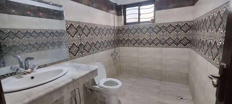 24 Marla 3 Story House With Basement Available For Rent, 9 Bed Room With attached Bath, Drawing Dinning, 3 Kitchen, 3 T. V lounge, Servant Quarter On Top With attached Bath 15