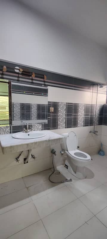 24 Marla 3 Story House With Basement Available For Rent, 9 Bed Room With attached Bath, Drawing Dinning, 3 Kitchen, 3 T. V lounge, Servant Quarter On Top With attached Bath 38