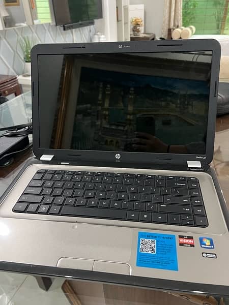 HP Pavilion g series + laptop bag 1